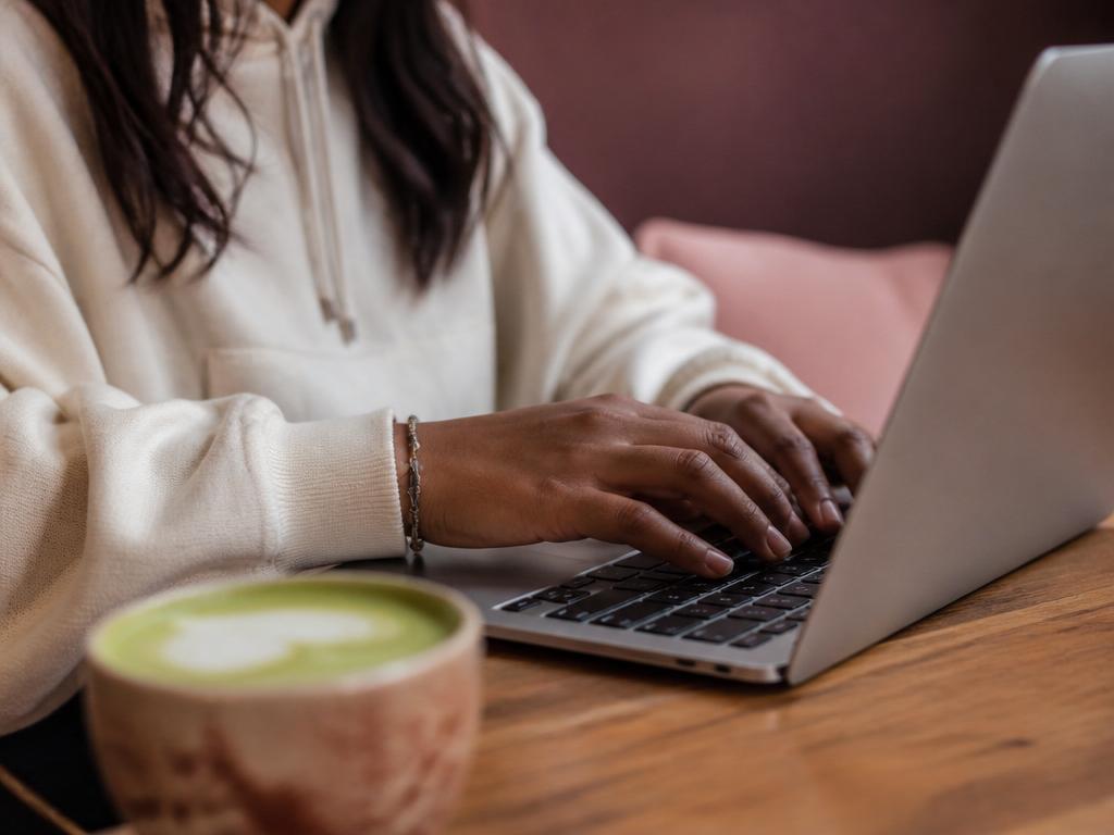 Recruiter reviewing verified proof on a laptop